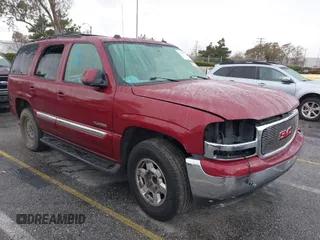 2004 GMC Yukon SLT with VIN 1GKEC13T44R322378, listed as a IAAI auction lot 41500951 with 1 mi miles. Bid and sale history available at carsss.com. Image 1.