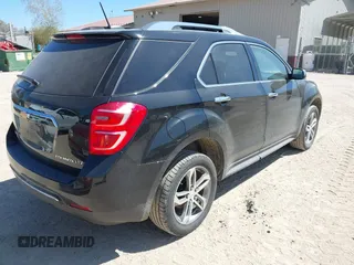 2016 Chevrolet Equinox LTZ z VIN 2GNFLGEK8G6288671, wystawiony jako IAAI lot #42220704 z przebiegiem 91 606 mil mil oraz . Historia ofert i sprzedaży dostępna na DreamBid. Obrazek 4.