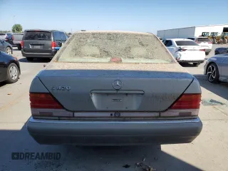 1995 Mercedes-Benz S with VIN WDBGA43E9SA220971, listed as a Copart auction lot 70834144 with Not Provided miles and Clean Title. Bid and sale history available at DreamBid. Image 6.