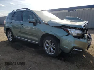 2017 Subaru Forester Touring with VIN JF2SJAWC8HH577564, listed as a Copart auction lot 50696055 with 90,365 mi miles and Salvage Title. Bid and sale history available at DreamBid. Image 4.