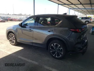 2022 Mazda CX-5 2.5 S Premium Package with VIN JM3KFBDM5N0602570, listed as a Copart auction lot 50441125 with 25,199 mi miles and Salvage Title. Bid and sale history available at carsss.com. Image 2.