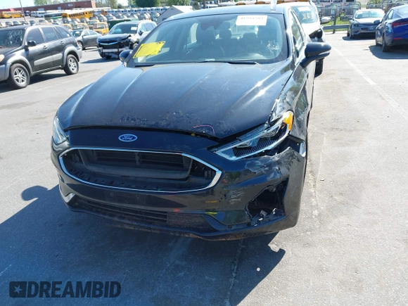 2019 Ford Fusion SEL with VIN 3FA6P0MU6KR252797, listed as a IAAI auction lot 41994504 with 106,029 mi miles and . Bid and sale history available at DreamBid. Image 6.