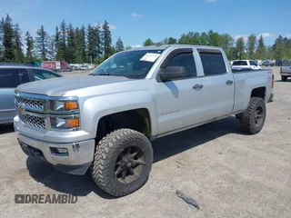 2014 Chevrolet Silverado 1500 LT with VIN 3GCUKREH0EG399090, listed as a IAAI auction lot 42142324 with 104,226 mi miles and . Bid and sale history available at DreamBid. Image 2.