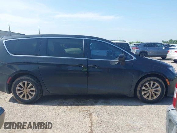 2017 Chrysler Pacifica Touring with VIN 2C4RC1DG6HR509717, listed as a IAAI auction lot 42228096 with 86,956 mi miles and . Bid and sale history available at DreamBid. Image 13.