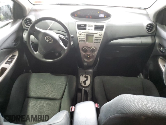 2009 Toyota Yaris z VIN JTDBT903991335683, wystawiony jako Copart lot #52565155 z przebiegiem 143 737 mil mil oraz Szkody całkowita. Historia ofert i sprzedaży dostępna na DreamBid. Obrazek 8.