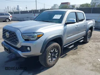 2020 Toyota Tacoma SR5 with VIN 3TMAZ5CN7LM138859, listed as a IAAI auction lot 42150725 with 36,462 mi miles and . Bid and sale history available at DreamBid. Image 2.