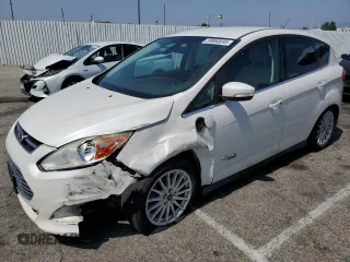 2015 Ford C-Max SEL z VIN 1FADP5CU1FL103305, wystawiony jako Copart lot #59980695 z przebiegiem 118 972 mil mil oraz Szkoda całkowita • Salvage title. Historia ofert i sprzedaży dostępna na DreamBid. Obrazek 1.