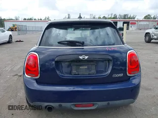 2017 MINI Hardtop 4 Door Cooper with VIN WMWXU1C54H2E19114, listed as a IAAI auction lot 42107266 with 83,524 mi miles and . Bid and sale history available at DreamBid. Image 17.