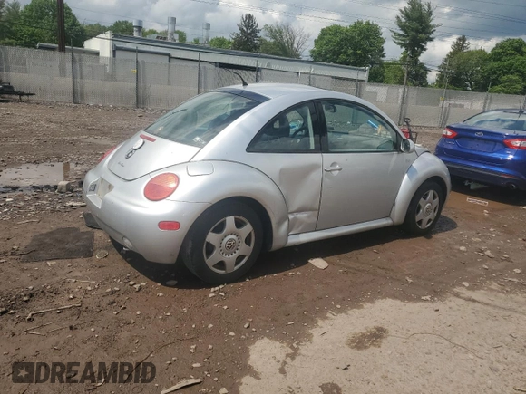 2001 Volkswagen Beetle GLX with VIN 3VWDD21C21M406898, listed as a Copart auction lot 55597675 with 104,597 mi miles and Salvage Title. Bid and sale history available at DreamBid. Image 3.