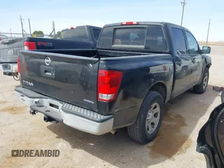 2014 Nissan Titan SV with VIN 1N6BA0EK6EN507279, listed as a IAAI auction lot 41870383 with 205,603 mi miles. Bid and sale history available at carsss.com. Image 4.