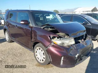 2013 Scion xB with VIN JTLZE4FEXDJ040738, listed as a IAAI auction lot 41878175 with 119,801 mi miles. Bid and sale history available at carsss.com. Image 1.