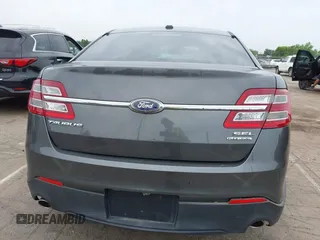 2015 Ford Taurus SEL z VIN 1FAHP2E81FG163058, wystawiony jako IAAI lot #42279778 z przebiegiem 127 957 mil mil oraz . Historia ofert i sprzedaży dostępna na DreamBid. Obrazek 16.