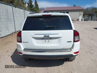 2016 Jeep Compass High Altitude with VIN 1C4NJDEB4GD767731, listed as a IAAI auction lot 41977400 with 99,890 mi miles and . Bid and sale history available at DreamBid. Image 16.