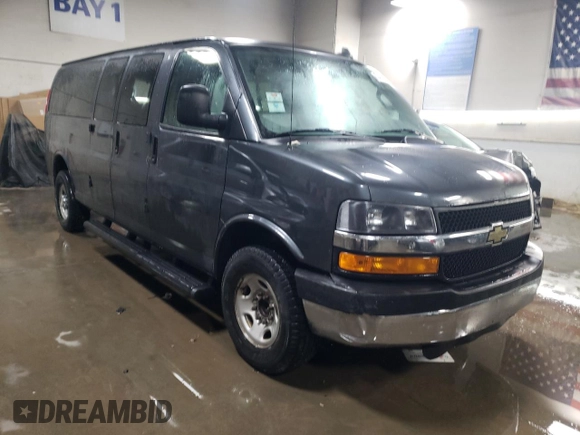 2016 Chevrolet Express Passenger LT with VIN 1GAZGPFF1G1336602, listed as a Copart auction lot 83389654 with 164,012 mi miles and Salvage title. Bid and sale history available at DreamBid. Image 4.