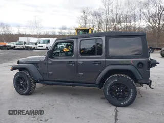 2021 Jeep Wrangler Unlimited Sport S with VIN 1C4HJXDN9MW822281, listed as a IAAI auction lot 41163183 with 23,665 mi miles and . Bid and sale history available at DreamBid. Image 14.