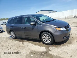2015 Honda Odyssey EX-L with VIN 5FNRL5H63FB017177, listed as a Copart auction lot 52347205 with 83,148 mi miles and Salvage Title. Bid and sale history available at DreamBid. Image 4.