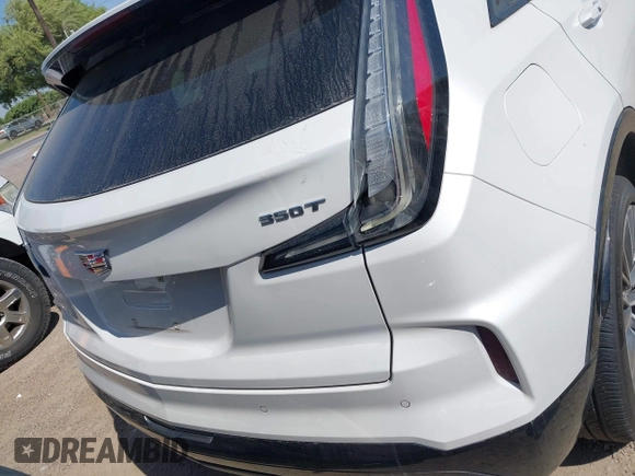 2024 Cadillac XT4 FWD Sport with VIN 1GYFZER43RF133293, listed as a IAAI auction lot 42055906 with 25,398 mi miles and . Bid and sale history available at DreamBid. Image 16.