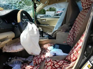 2017 Toyota Camry XLE z VIN 4T1BF1FK0HU700820, wystawiony jako Copart lot #52010655 z przebiegiem Nie podano mil oraz Szkoda całkowita • Salvage title. Historia ofert i sprzedaży dostępna na DreamBid. Obrazek 7.
