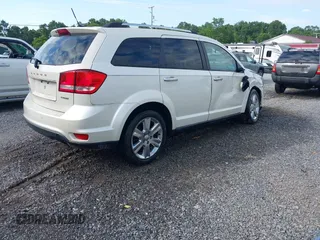 2013 Dodge Journey Crew with VIN 3C4PDDDG9DT685464, listed as a IAAI auction lot 42641982 with 155,901 mi miles and . Bid and sale history available at DreamBid. Image 4.