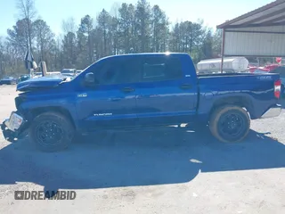 2015 Toyota Tundra SR5 with VIN 5TFDW5F18FX463923, listed as a IAAI auction lot 41625161 with 159,323 mi miles and . Bid and sale history available at DreamBid. Image 14.