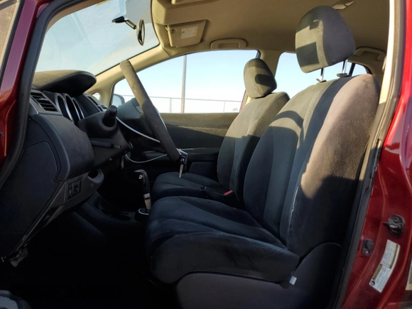 2009 Nissan Versa 1.8 S with VIN 3N1BC11E39L363606, listed as a Copart auction lot 65594774 with 110,191 mi miles and Salvage Title. Bid and sale history available at carsss.com. Image 7.