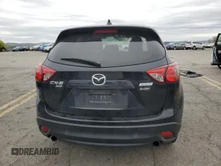 2015 Mazda CX-5 Touring with VIN JM3KE4CY3F0475757, listed as a Copart auction lot 53477875 with 104,546 mi miles and Salvage Title. Bid and sale history available at carsss.com. Image 6.