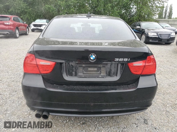 2010 BMW 3 Series 328i with VIN WBAPH7G55ANM53372, listed as a Copart auction lot 61075495 with 81,952 mi miles and Salvage title. Bid and sale history available at DreamBid. Image 6.