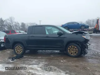2021 Honda Ridgeline Sport with VIN 5FPYK3F12MB002877, listed as a IAAI auction lot 41576812 with 51,658 mi miles and . Bid and sale history available at DreamBid. Image 14.