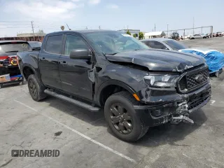 2023 Ford Ranger XL with VIN 1FTER4EH4PLE04252, listed as a Copart auction lot 58993055 with 20,307 mi miles and Salvage title. Bid and sale history available at DreamBid. Image 4.