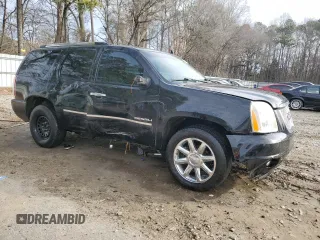 2012 GMC Yukon Denali with VIN 1GKS1EEF1CR304040, listed as a Copart auction lot 42874135 with 182,879 mi miles and Salvage Title. Bid and sale history available at carsss.com. Image 4.