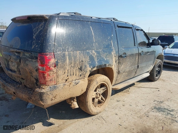 2012 Chevrolet Suburban LT with VIN 1GNSCJE09CR237611, listed as a IAAI auction lot 41697643 with 184,920 mi miles. Bid and sale history available at carsss.com. Image 4.
