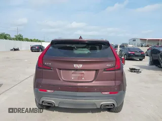 2023 Cadillac XT4 FWD Premium Luxury with VIN 1GYFZCR47PF106017, listed as a IAAI auction lot 42283401 with 40,734 mi miles and . Bid and sale history available at DreamBid. Image 16.