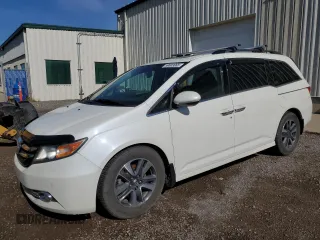 2015 Honda Odyssey Touring Elite with VIN 5FNRL5H97FB510855, listed as a Copart auction lot 59803065 with 184,384 mi miles and Salvage title. Bid and sale history available at DreamBid. Image 1.