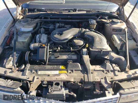 1988 Cadillac Eldorado with VIN 1G6EL1153JU612185, listed as a Copart auction lot 83786144 with 133,882 mi miles and Salvage Title. Bid and sale history available at DreamBid. Image 11.