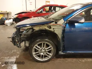2009 Scion tC with VIN JTKDE167990297921, listed as a IAAI auction lot 41720687 with 159,960 mi miles. Bid and sale history available at carsss.com. Image 18.
