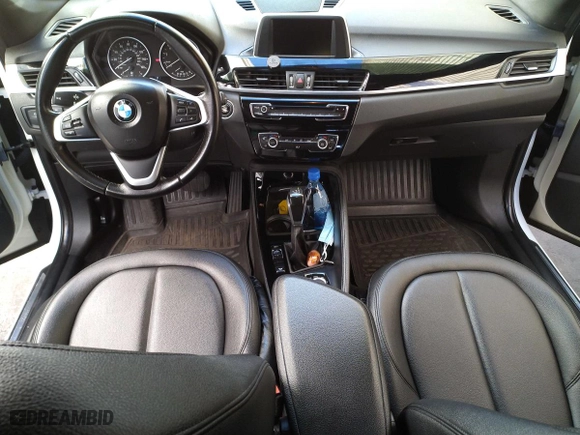 2016 BMW X1 xDrive28i with VIN WBXHT3C3XGP880243, listed as a Copart auction lot 54556895 with 57,200 mi miles and Clean Title. Bid and sale history available at carsss.com. Image 9.