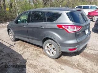 2013 Ford Escape SE with VIN 1FMCU9GX5DUD72758, listed as a IAAI auction lot 41983665 with 282,604 mi miles. Bid and sale history available at carsss.com. Image 3.