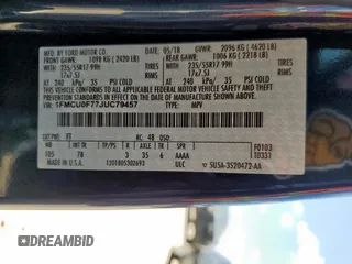 2018 Ford Escape S with VIN 1FMCU0F77JUC79457, listed as a Copart auction lot 59812235 with 54,272 mi miles and Salvage title. Bid and sale history available at DreamBid. Image 14.
