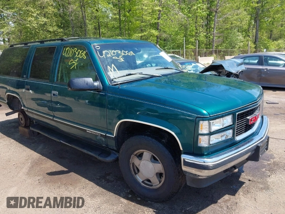 1997 GMC Suburban with VIN 3GKFK16R5VG508908, listed as a IAAI auction lot 42103068 with 264,446 mi miles and . Bid and sale history available at DreamBid. Image 1.