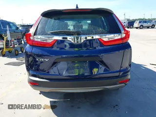 2019 Honda CR-V LX with VIN 2HKRW5H37KH415257, listed as a IAAI auction lot 41879318 with 156,721 mi miles. Bid and sale history available at carsss.com. Image 17.