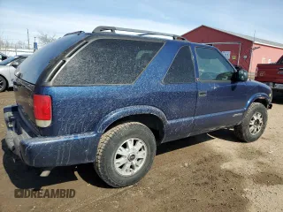 2003 GMC Jimmy z VIN 1GKCT18X43K110056, wystawiony jako Copart lot #48671585 z przebiegiem 272 867 mil mil oraz Czysty tytuł • Clean title. Historia ofert i sprzedaży dostępna na DreamBid. Obrazek 3.