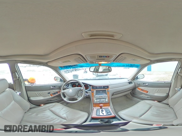 2004 Acura RL w/Navigation System z VIN JH4KA96664C007799, wystawiony jako Copart lot #44207245 z przebiegiem 215 098 mil mil oraz Szkoda całkowita • Salvage title. Historia ofert i sprzedaży dostępna na DreamBid. Obrazek 13.