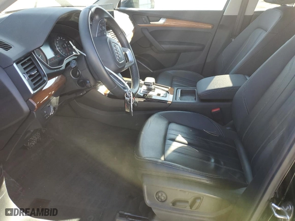 2021 Audi Q5 Premium with VIN WA1AAAFY9M2111834, listed as a Copart auction lot 46977295 with 56,388 mi miles and Salvage Title. Bid and sale history available at carsss.com. Image 7.
