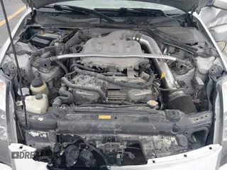 2003 Nissan 350Z Touring z VIN JN1AZ34E43T014247, wystawiony jako IAAI lot #42120812 z przebiegiem 112 263 mil mil oraz . Historia ofert i sprzedaży dostępna na DreamBid. Obrazek 10.