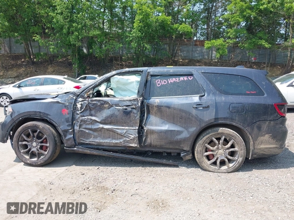 2015 Dodge Durango R/T with VIN 1C4SDJCT1FC832916, listed as a IAAI auction lot 42401260 with Not provided miles and . Bid and sale history available at DreamBid. Image 14.