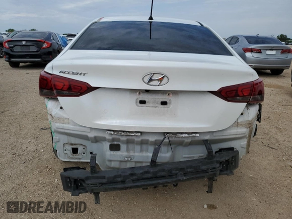 2021 Hyundai Accent SE z VIN 3KPC24A67ME147852, wystawiony jako Copart lot #56065625 z przebiegiem 77 003 mil mil oraz Szkoda całkowita • Salvage title. Historia ofert i sprzedaży dostępna na DreamBid. Obrazek 6.