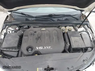 2014 Chevrolet Impala LTZ with VIN 1G1155S38EU170626, listed as a IAAI auction lot 41829108 with 137,817 mi miles. Bid and sale history available at carsss.com. Image 10.