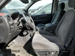 2006 GMC Envoy SLE with VIN 1GKET16S766125647, listed as a Copart auction lot 74894724 with 162,905 mi miles and Salvage Title. Bid and sale history available at DreamBid. Image 7.
