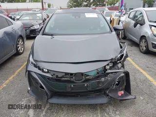 2018 Toyota Prius Plus with VIN JTDKARFP5J3095377, listed as a IAAI auction lot 42153552 with 77,255 mi miles and . Bid and sale history available at DreamBid. Image 6.