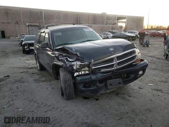 2001 Dodge Durango z VIN 1B4HS28Z21F637575, wystawiony jako Copart lot #83012674 z przebiegiem 276 619 mil mil oraz Szkoda całkowita • Salvage title. Historia ofert i sprzedaży dostępna na DreamBid. Obrazek 10.